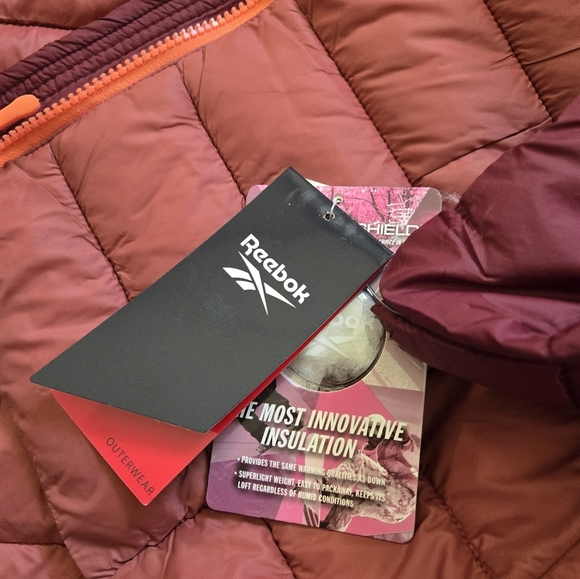 Reebok NEW WITH TAGS  Women's Burgundy and Orange Puffer Jacket. Size Small - Picture 13 of 15